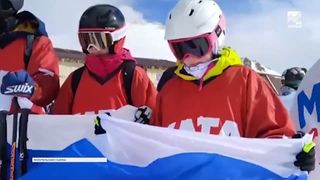 В Домбае прошел флешмоб в поддержку российских олимпийцев